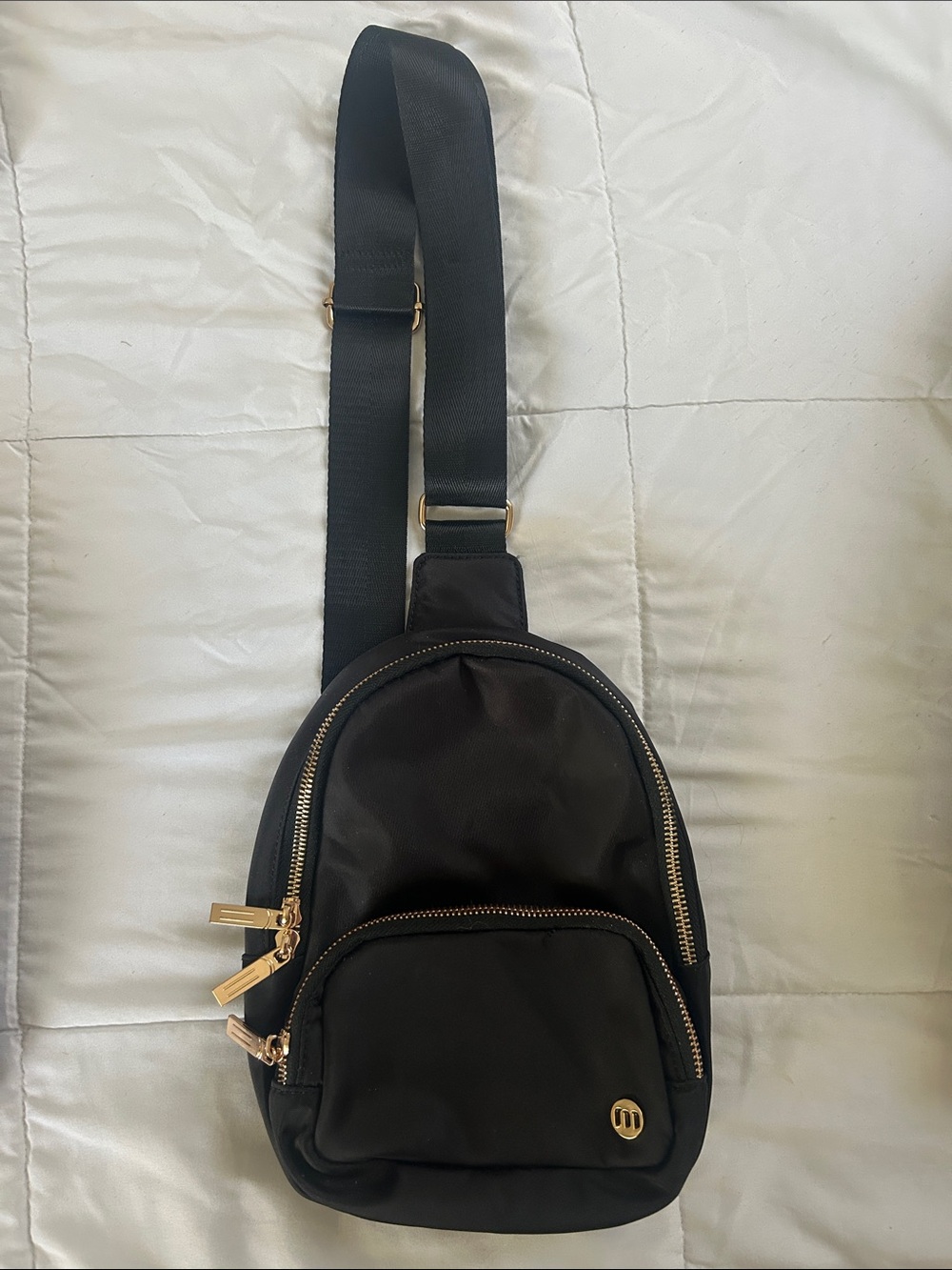 Black Sling Crossbody Bag by Mexs with Gold Hardware